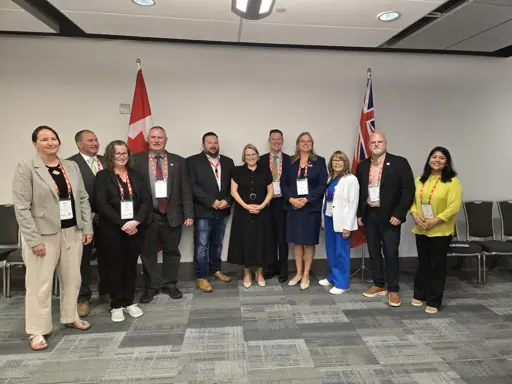 Picture of people standing in a room