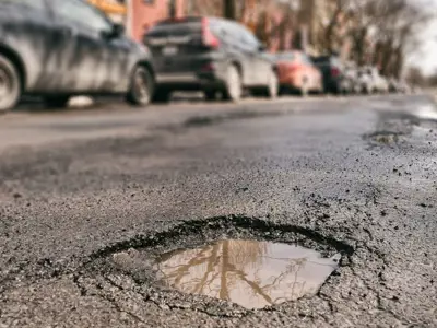 Image of a pothole in a street