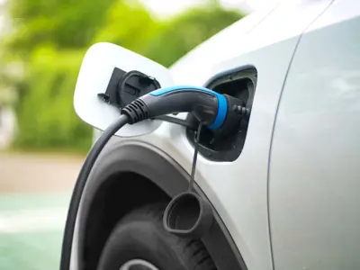 electric vehicle plugged into charger
