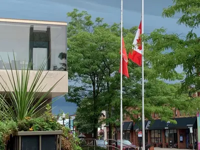 City Hall flags at half mast